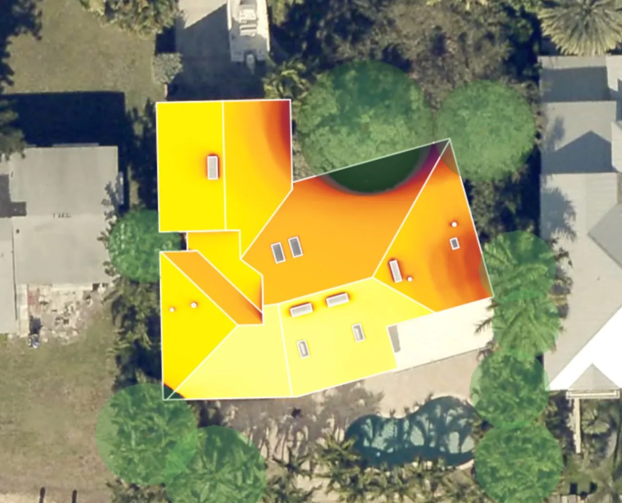 Aerial irradiance modeling of a South Florida home — roof planes shaded yellow-to-orange by annual sun exposure